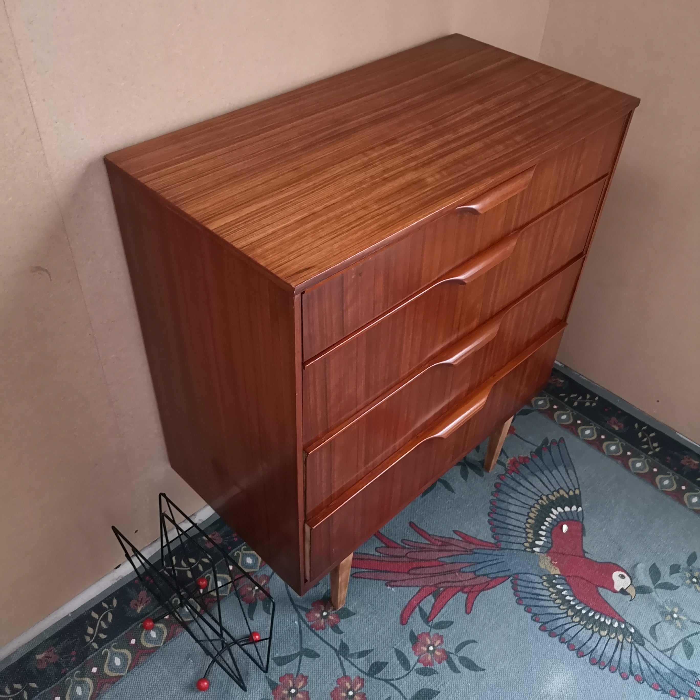 Teak chest of drawers on tapered legs