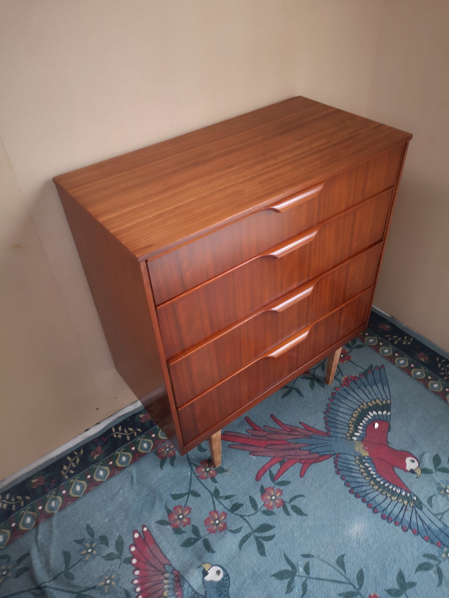 Teak chest of drawers on tapered legs