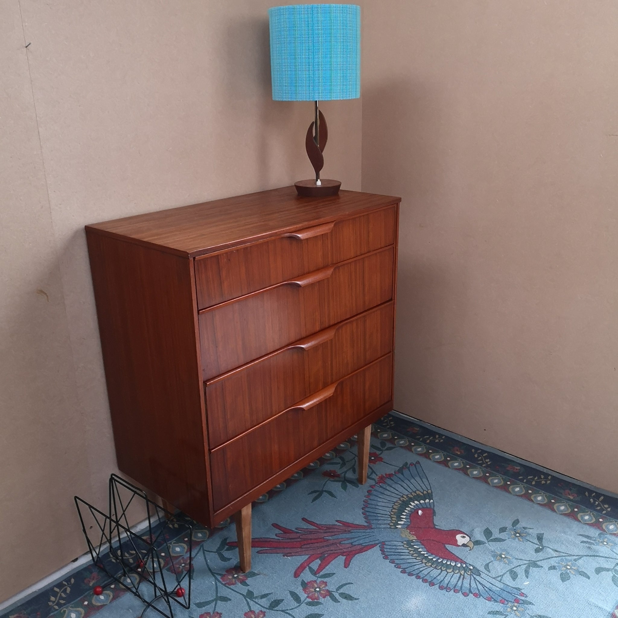 Teak chest of drawers on tapered legs